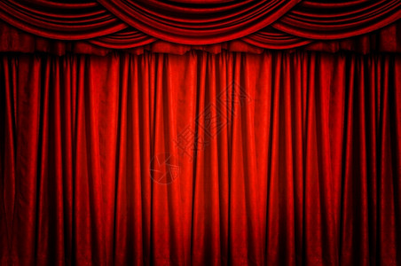 喜剧戏娱乐背景窗帘的红色天鹅绒台幕图片
