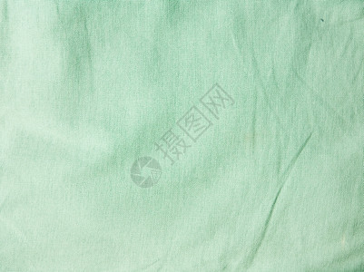 温暖的织物柔软绿色皱纹织质料图片