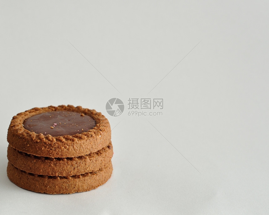 一堆金棕色饼干吃蛋糕面包屑图片