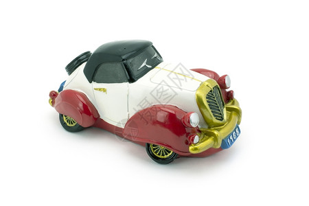 白色背景的古董模拟车老式的白色玩具背景图片