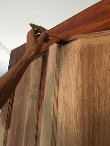木头颜色手工人画的木门很漂亮棕色的图片