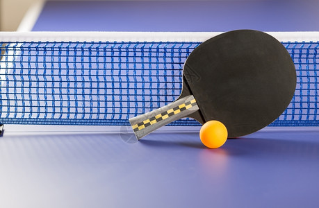 乒乓球比赛中玩家游戏网手木头背景图片