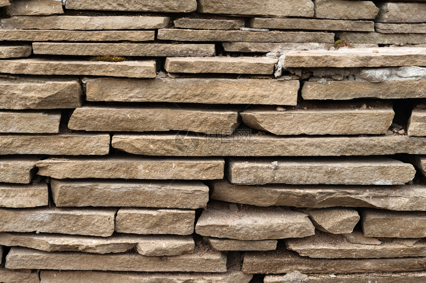 大理石砂岩作为背景的灰色和棕石块瓷砖自然图片