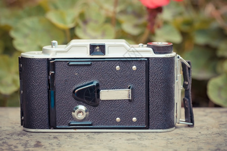 电影用模拟胶片制作的古老照相机美丽设计镜片照图片