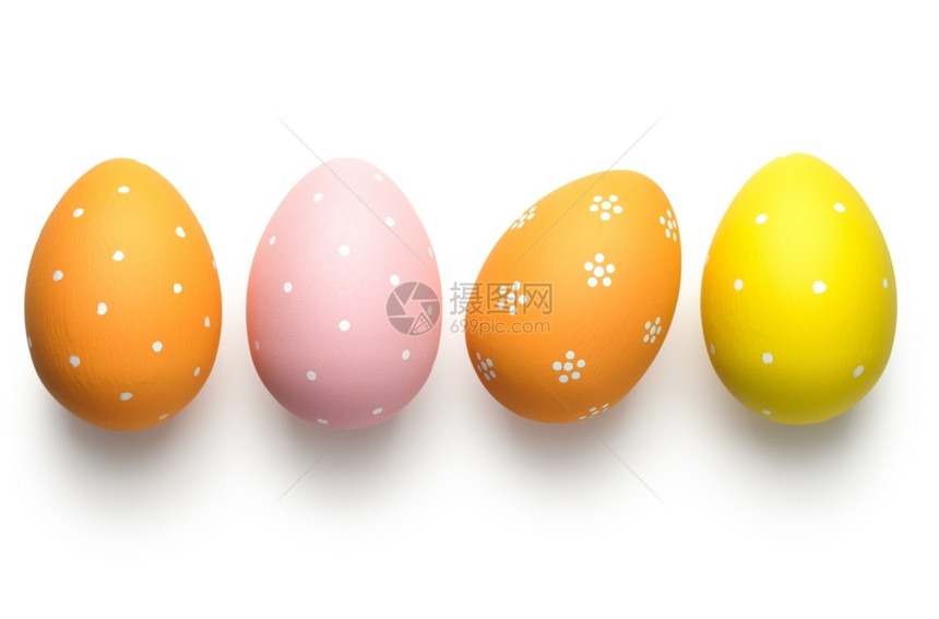 橙多于绿色白背景复活节概念上的日鸡蛋图片