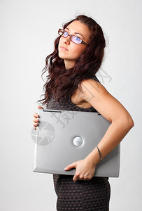 象征女士通讯带笔记本的年轻商业妇女图片