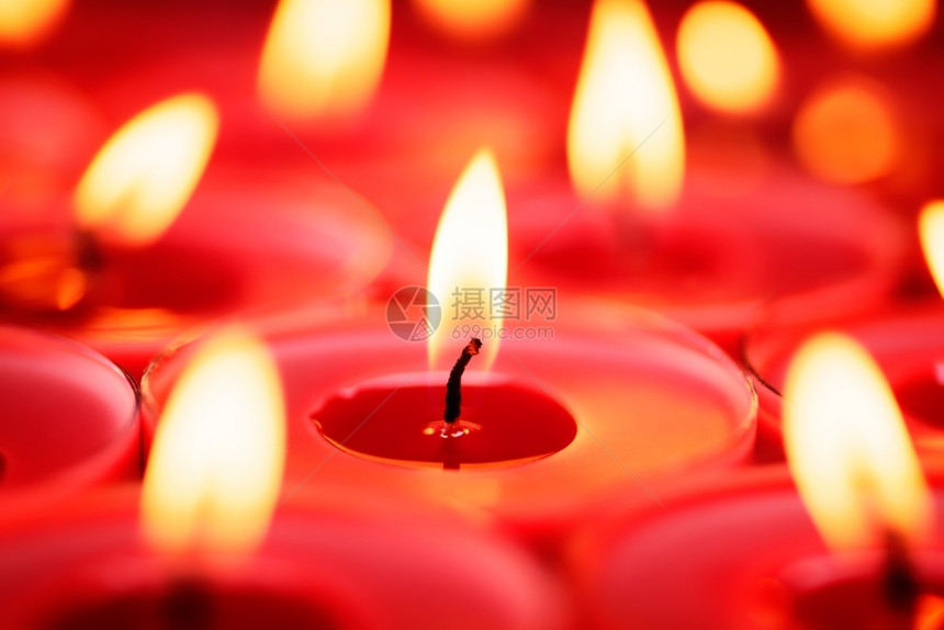 燃烧红蜡烛有选择的焦点假日或庆祝背景的近照拍摄和紧贴的背景纹身宗圣诞节图片