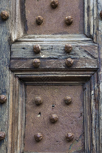 细节历史意大利托斯卡纳锡耶PalazzoPubblico门旅游的背景图片