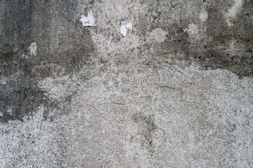 具体的水泥石质墙和背景污渍为了老的图片