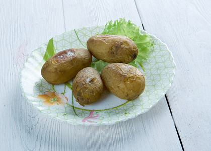 加那利语金丝雀在加那利群岛食用的传统烤土豆菜盘子在加那利群岛吃好东西图片