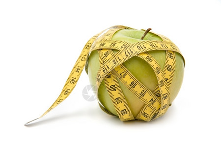 健康紧的意志苹果被一个测量磁带囚禁背景图片