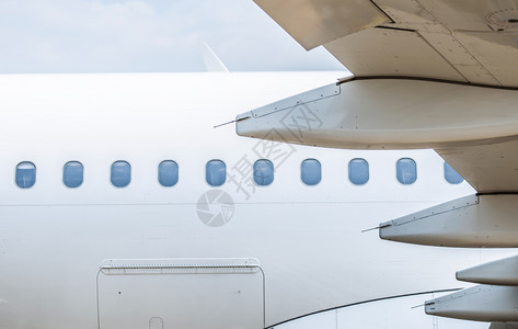 空气喷射视窗背景飞机翼的平面窗口图片