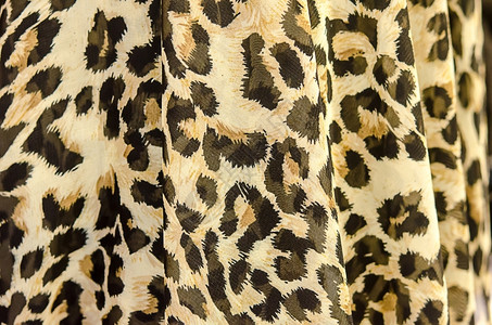 抽象的猫背景豹皮肤纹理纺织品图片