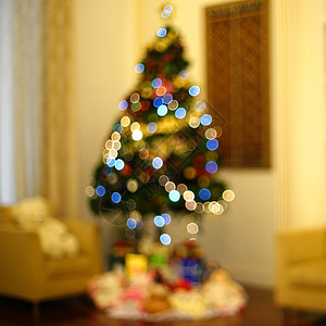 客厅圣诞树模糊背景背景图片
