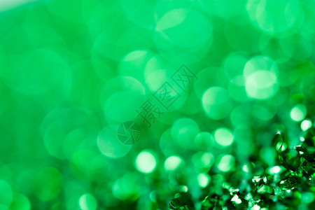 抽象绿色bokeh圣诞节装饰背景闪亮的自然假期图片