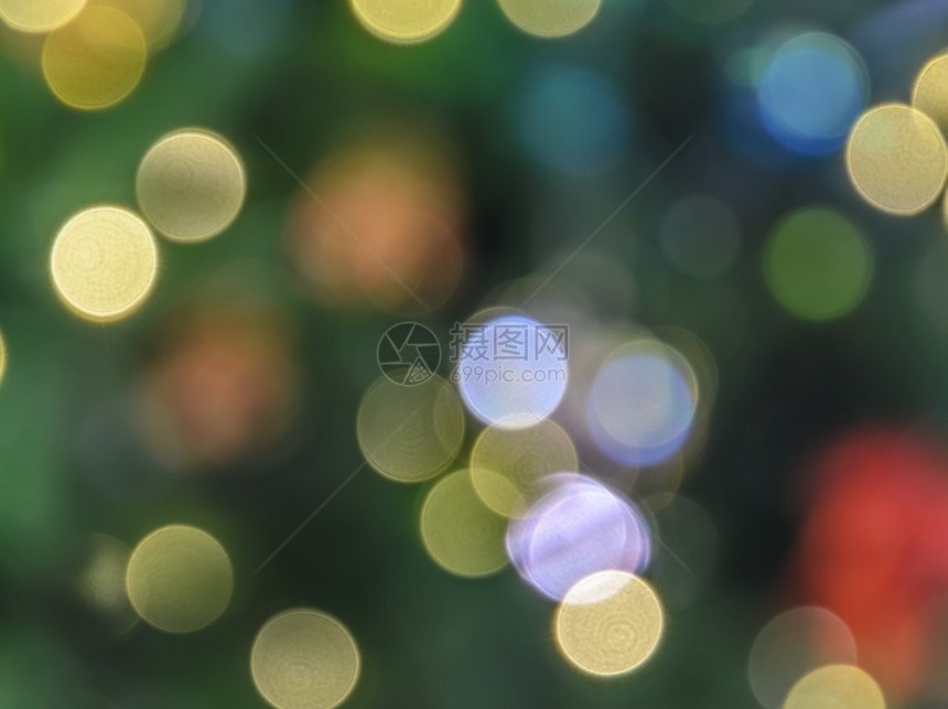圆形的模糊抽象色彩多的圣诞节bokeh背景绿色图片