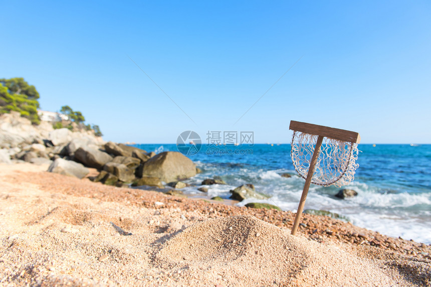 布拉瓦在海滩沙上渔网捕鱼假期捉图片