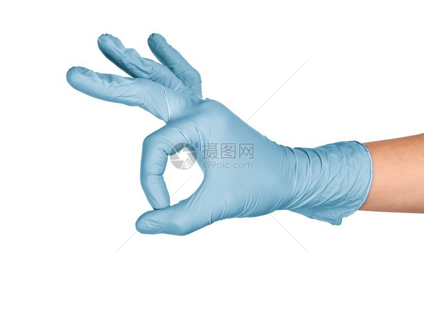 蓝色的放或者手在白色背景上显示ok手势戴蓝色乳胶套隔离在白色Womanrsquos手势或符号隔离在白色图片