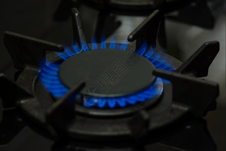 地狱火刻录机蓝色的发光火焰燃煤气炉灶背景
