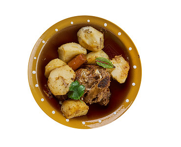 烹饪油希腊的羊肉面包土豆红菜和柠檬一顿饭高清图片