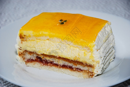 甜的糕点美味蛋夹奶油和黄果酱庆典图片