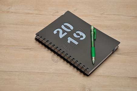 喜庆的2019年日记和木本上铅笔提醒记本图片