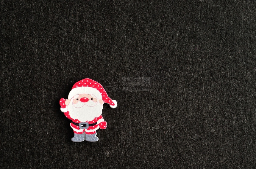 克劳斯白色的象征圣诞老人被隔离在黑色背景上图片