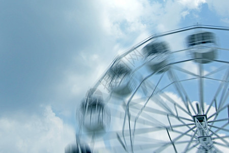 Ferris轮运动模糊复制空间假期摇摆令人兴奋的图片