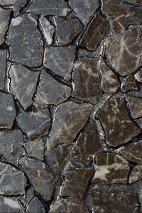 花岗岩结构体由小石头建造的装饰背景岩图片