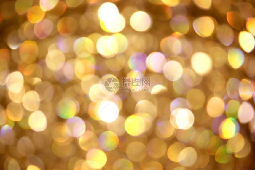 质地金色bokeh光作为背景的相片抽象庆典图片