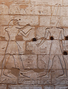 埃及卢克索神庙的救济寺庙游客墙图片