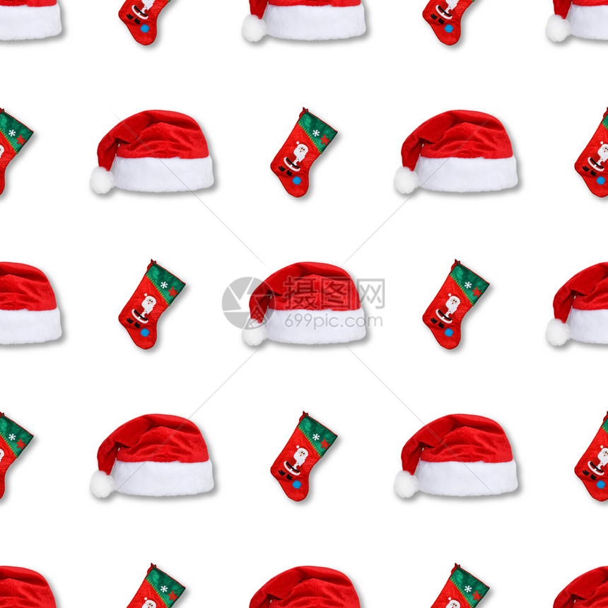 帽子白色的纺织品圣诞老人红帽和袜隔离在白色背景上圣诞无缝图案老人红帽和袜隔离在白色背景上图片