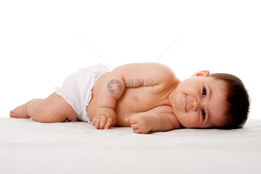 美丽又可爱和平舒适快乐的婴儿站在一边与世隔绝西班牙裔躺着白色的图片