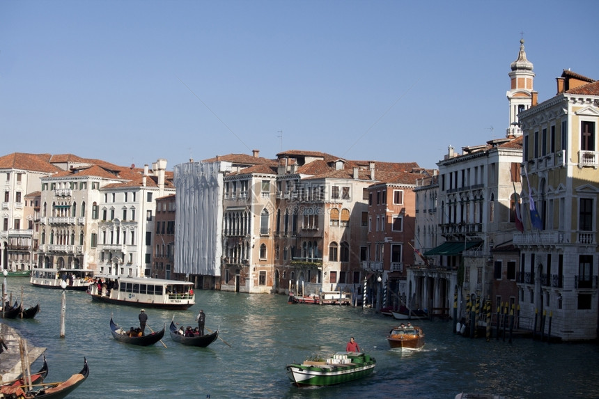 船夫意大利旅游一个典型的运河威尼斯市照片图片