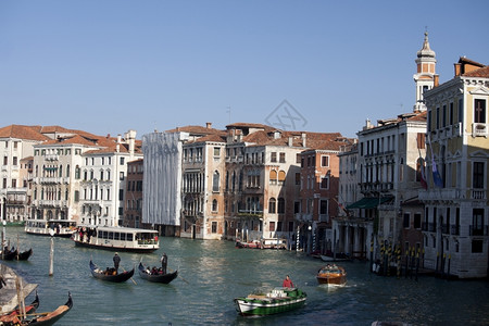 船夫意大利旅游一个典型的运河威尼斯市照片图片