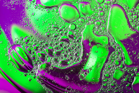 油滴的抽象背景油滴的抽象背景绿色橙降低图片