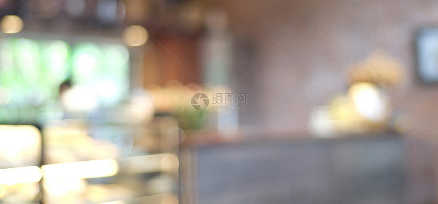 背景模糊咖啡馆带有bokeh光背景横旗食物和饮料概念柜台坐咖啡店图片
