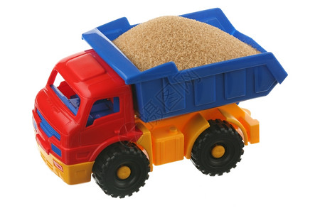 产品甜的运输卡车上糖是白色在背景上被隔离图片