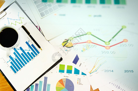 金融的成功管理财务文件图表和格上的商业概念图片
