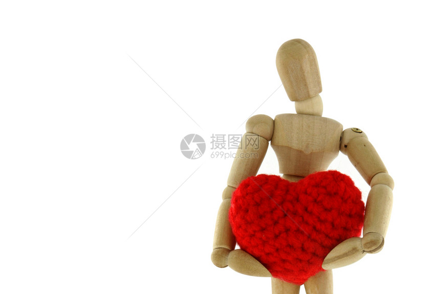 Woodenmannequin握着心脏编织的线条在白色背景上与世隔绝红色的周末木制图片