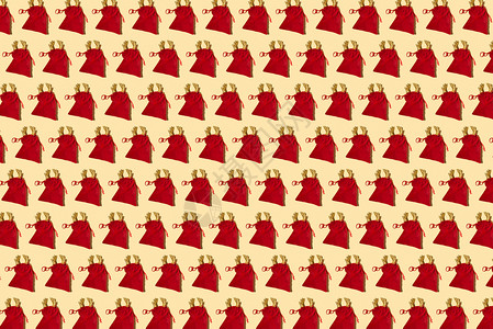 黄色背景的圣诞树袋图案目的季节红色背景图片