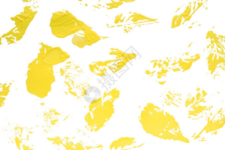 油漆污渍在白纸上涂黄色油漆的叶子隔离概念秋天笔触画落下设计图片
