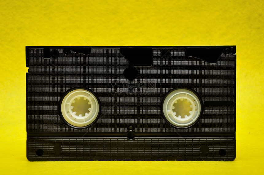 黑色的黄背景一盒隔绝录影带式磁优质的图片