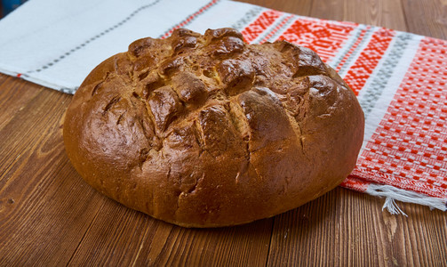 Palyanica斯拉夫白面包传统糕点关闭棕色的自制盐图片