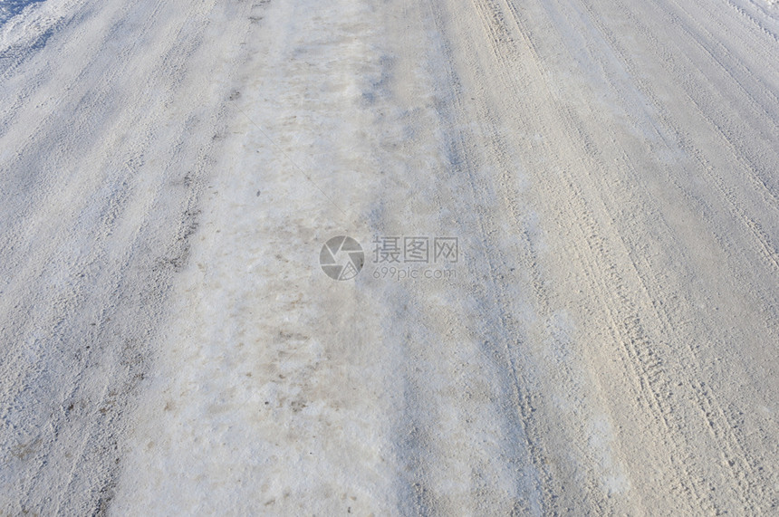 农村天寒冬日雪地乡村公路背景的封闭白色图片