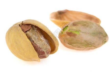 小吃白上孤立的Pistachios吃营养的图片