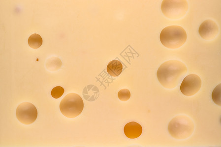 伊丹小吃乳制品有机的黄奶酪贴近纹理有大洞的黄起司食物背景奶酪有大洞的背景