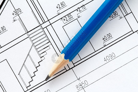 屋文档建设者使用蓝铅笔的工程和建筑图画图片