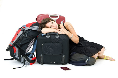 标签安全年轻女士在行李上休息旅疲倦检查图片