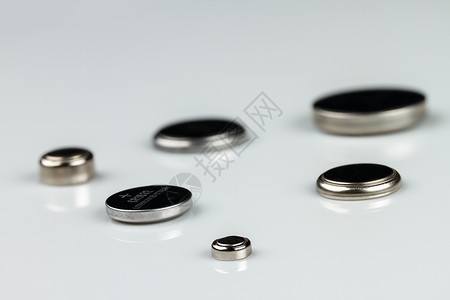 技术活力圆圈白色背景的一套锂纽扣电池组图片